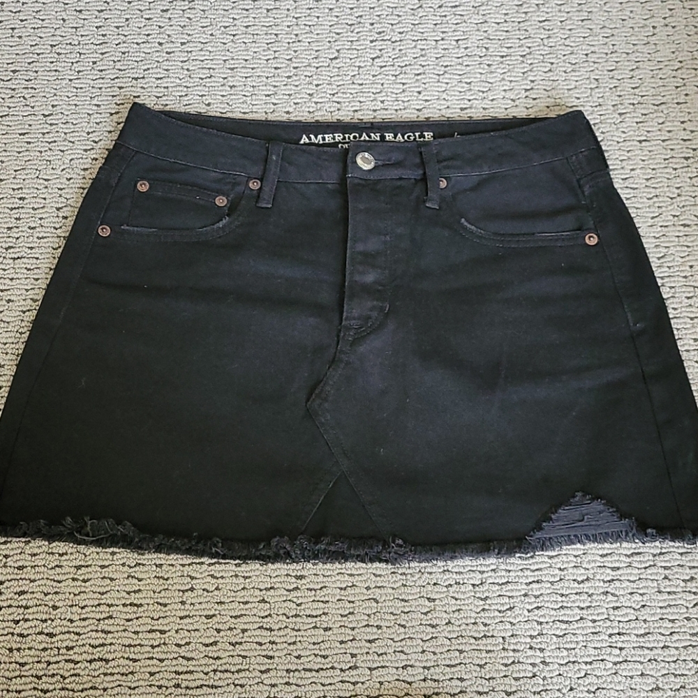 Black denim mini skirt